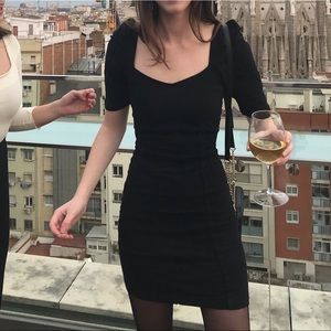 Black dress with puff sleeves